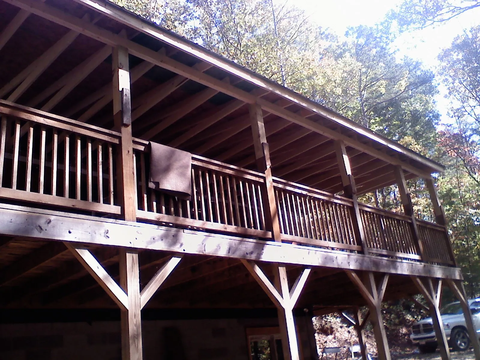 Timber framing under a new elevated porch and deck — Roof Leak Repair in Eastport by Roofing Brothers